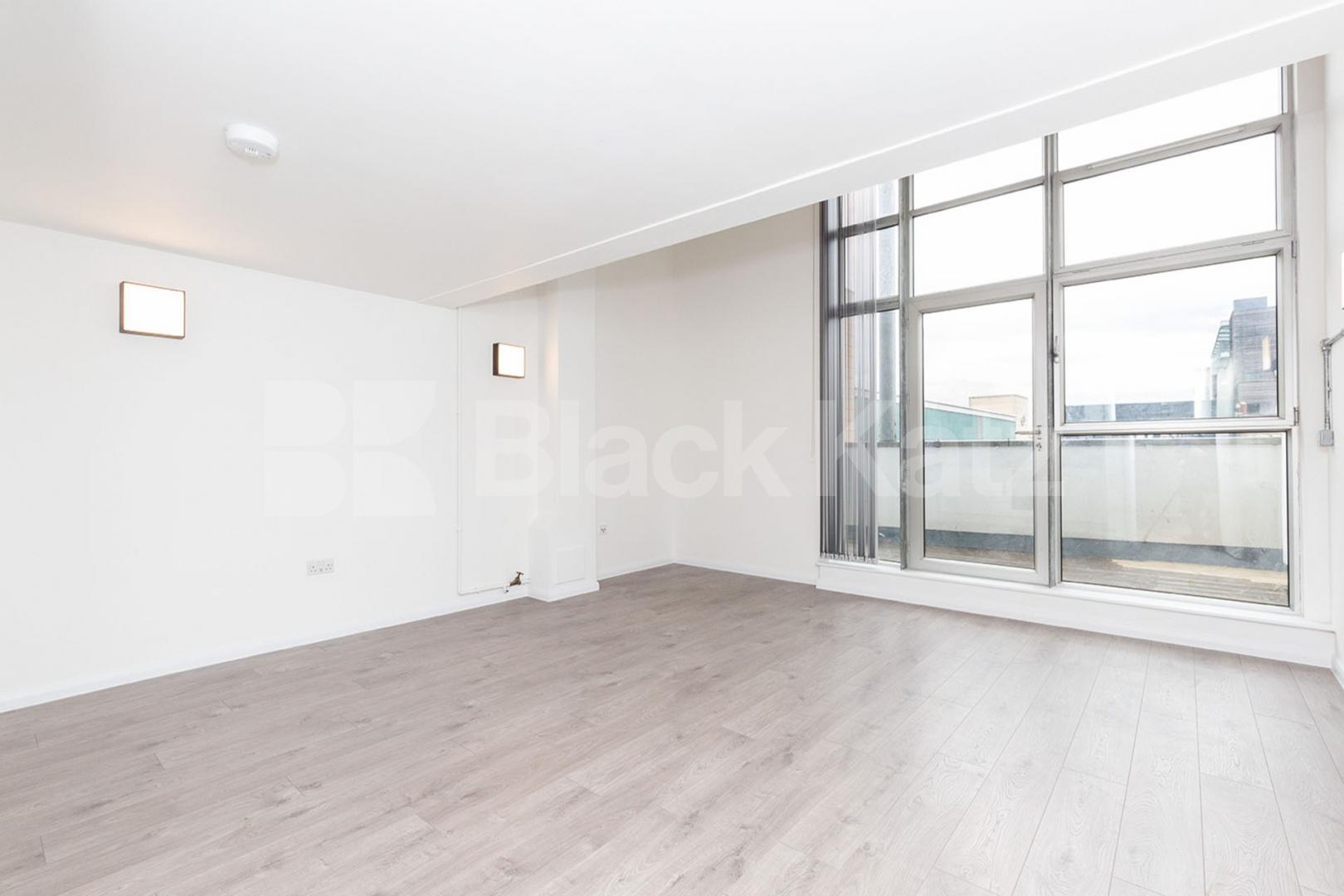 The iconic Ability Plaza development in Dalston with large terrace  Ability Plaza - Kingsland Road, Dalston / Haggerston